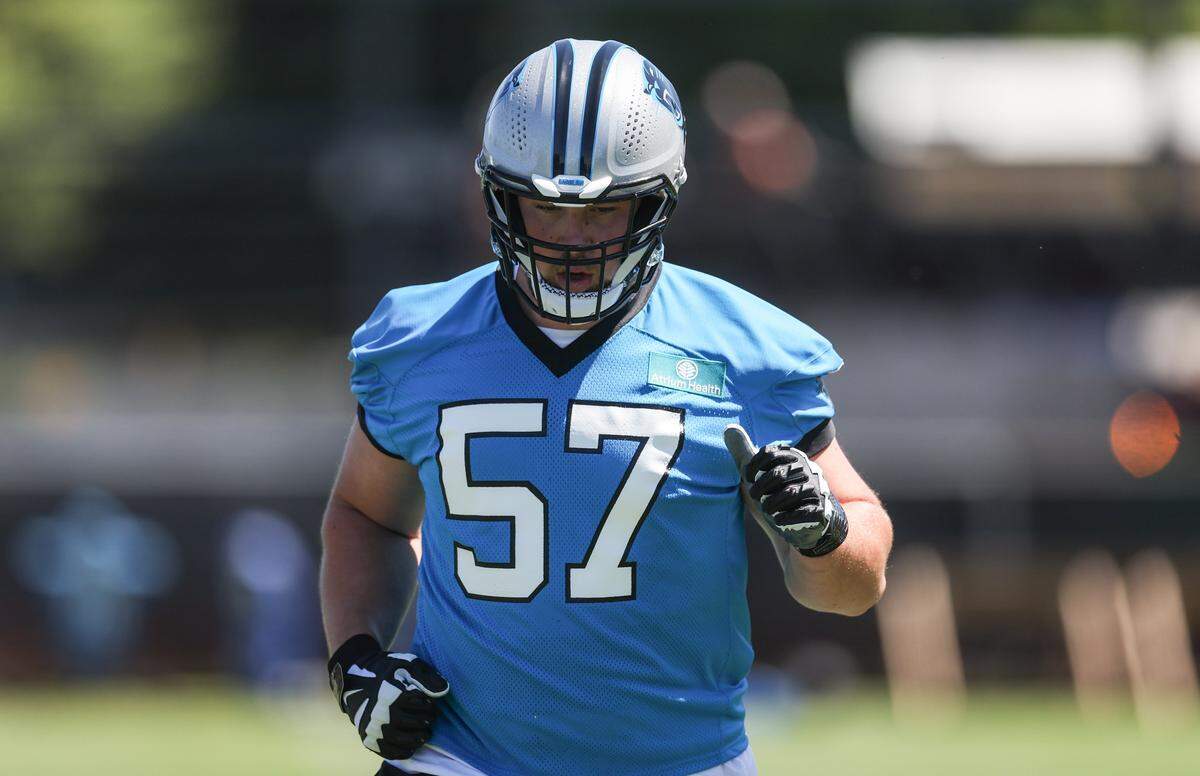 Panthers first round draft pick Monroe Freeling runs through warmups on day one of during rookie minicamp in Charlotte on Friday, May 8, 2026.