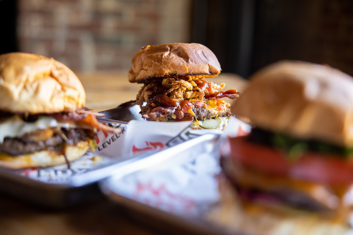 HBX Burger serves pub-style burgers with 1/3-pound beef patties on griddled brioche buns.