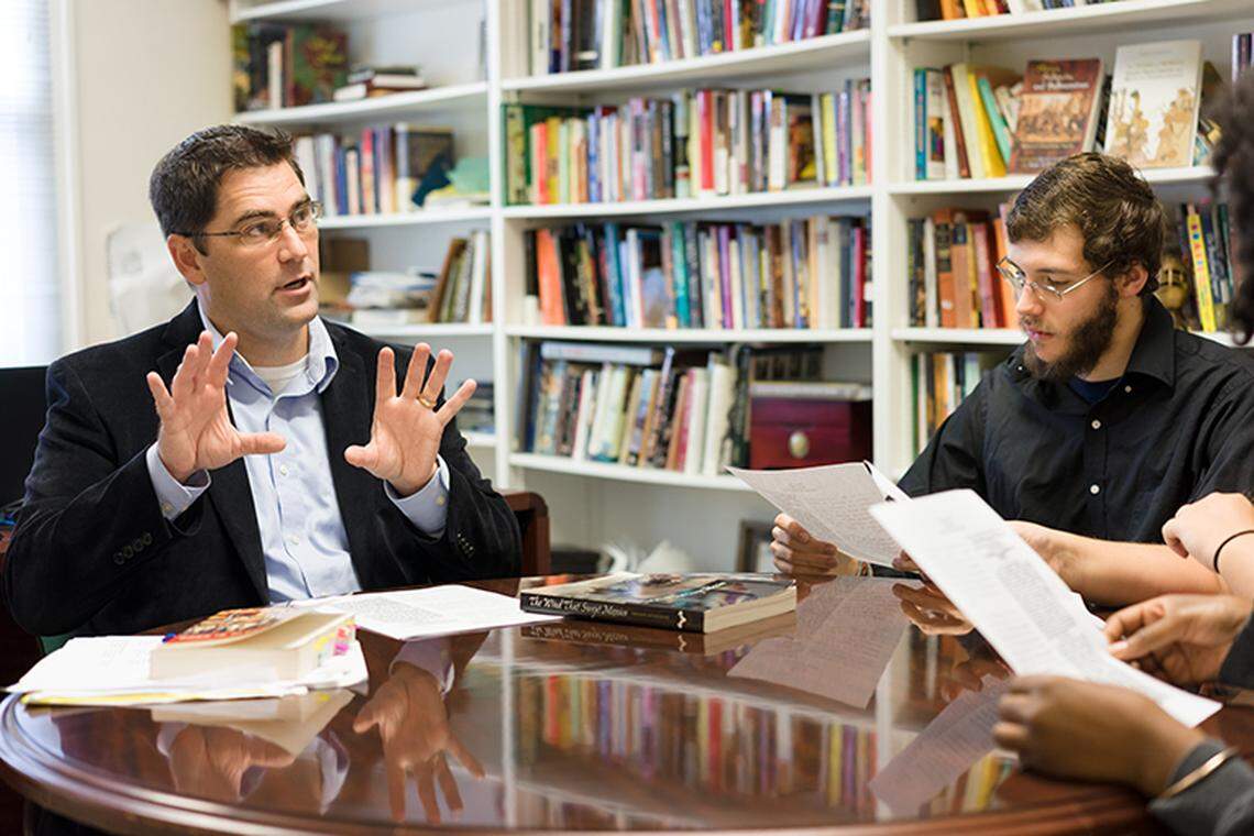 Queens University history department chair Barry Robinson leads a small group discussion. “I do not think that it is in the best interest of students for legislatures to micromanage what goes into the course curriculum,” Robinson said.