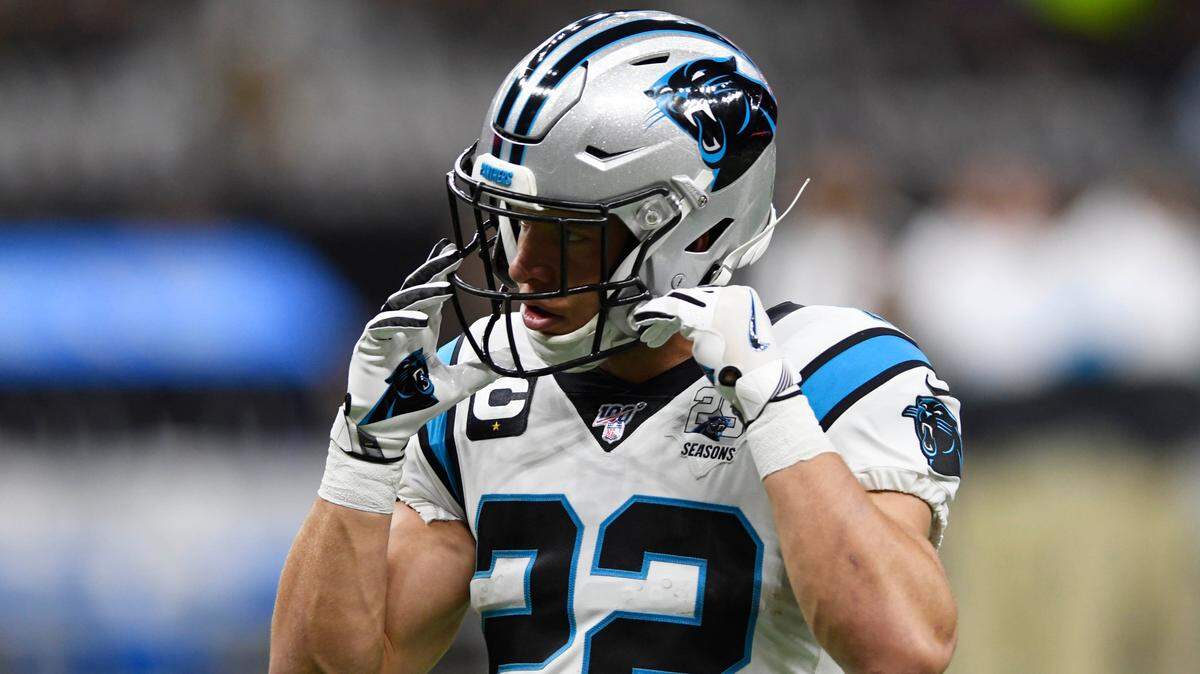 Carolina Panthers running back Christian McCaffrey (22) adjusts his helmet during warmups prior to playing the New Orleans Saints at the Mercedes-Benz Superdome in New Orleans, La on Sunday, November 24, 2019.
