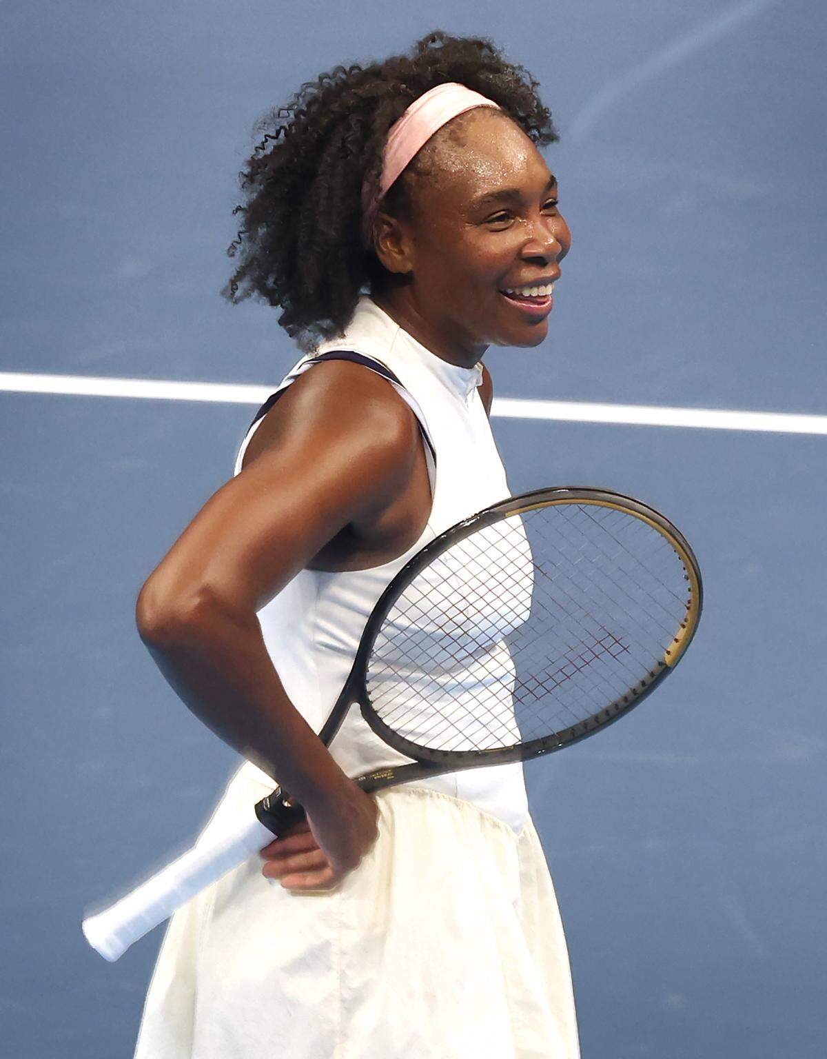 Venus Williams smiles at the crowd during her match against Madison Keys in the Charlotte Invitational on Thursday at Spectrum Center in Charlotte. Williams has made a tennis comeback at age 45.