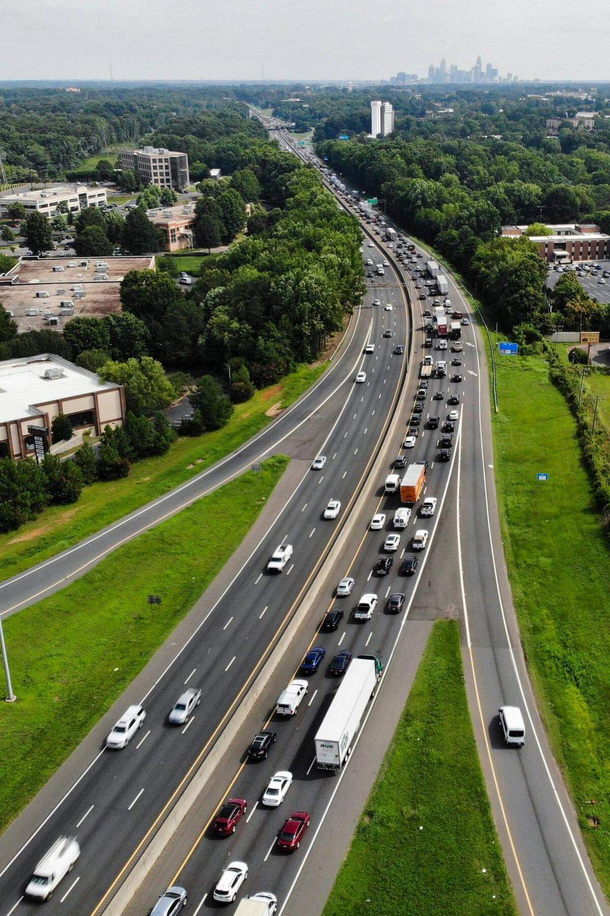 Drivers travel Interstate 77 near Arrowood Road in Charlotte, N.C., on Thursday, July 21, 2022. Members of a Charlotte-region transportation group will discuss proposed toll lanes from Brookshire Freeway in Charlotte to the South Carolina line on Wednesday, Oct. 19, 2022.
