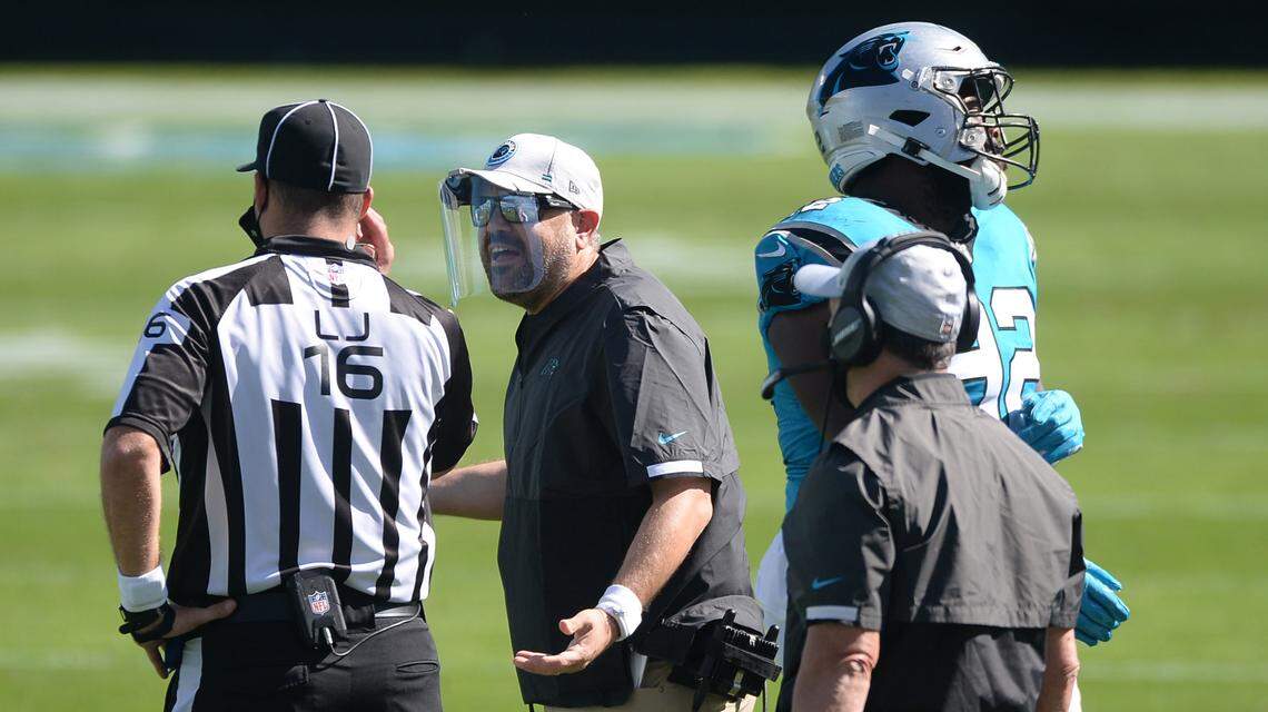 Carolina Panthers coach Matt Rhule (center) argues with an official during the first half of action against the Chicago Bears Sunday, Oct. 18, 2020.