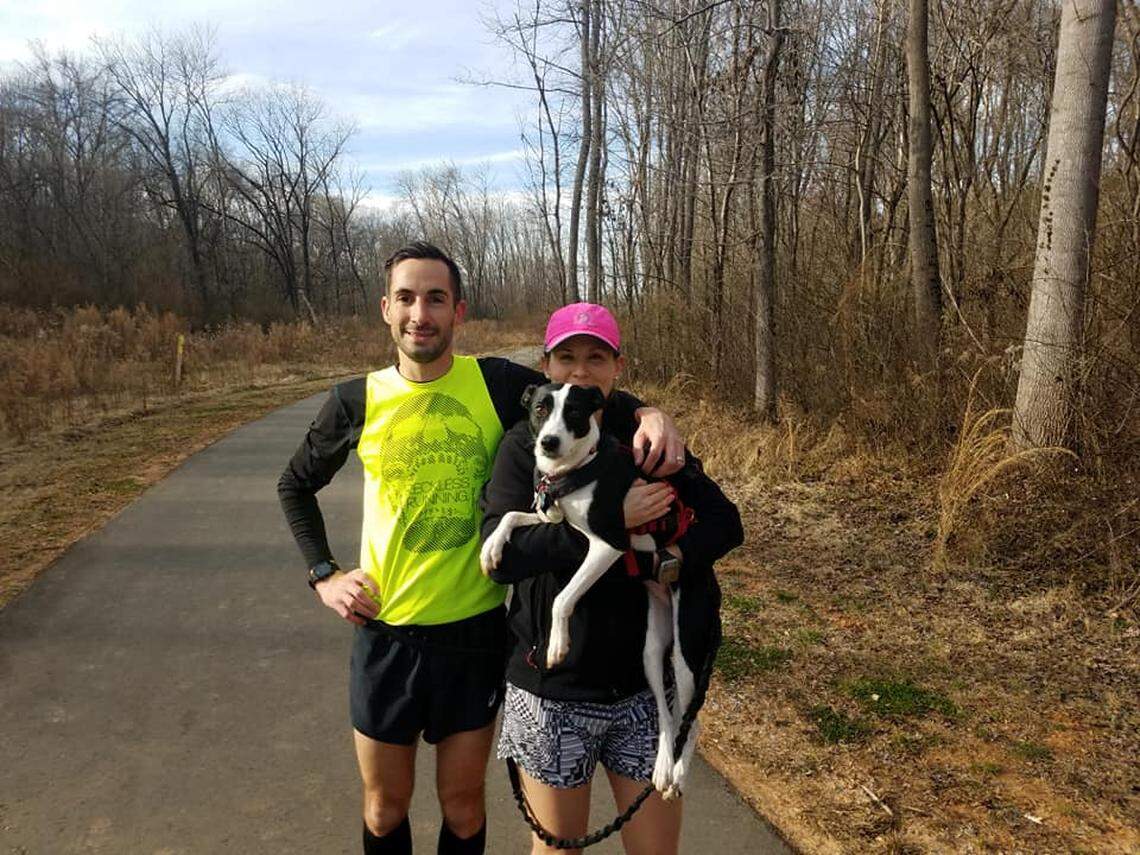 Anthony Famiglietti with Katie Rose and Bailey after the run at Fisher Farm in Davidson.