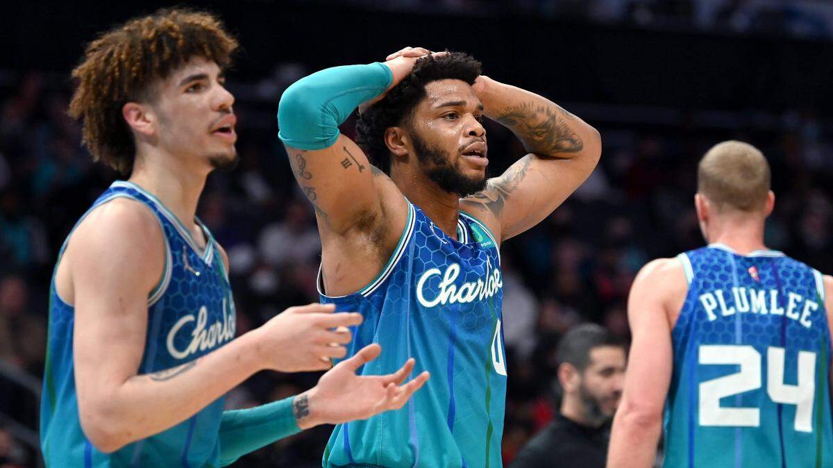 Charlotte Hornets guard LaMelo Ball, left and forward Miles Bridges, center, react to an officials foul call during action against the Chicago Bulls at Spectrum Center in Charlotte, NC on Wednesday, February 9, 2022. The Bulls defeated the Hornets 121-109.