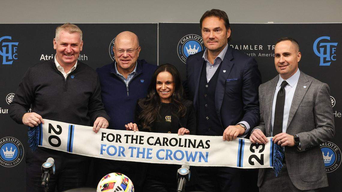 Charlotte FC’s new head coach Dean Smith, team owner David Tepper, Nicole Tepper, Charlotte FC sporting director Zoran Krneta and Charlotte FC President Joe LaBue pose at the end of an introductory press conference for Smith at Atrium Health Performance Park on Monday, December 18, 2023.