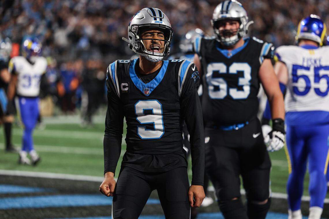Panthers quarterback Bryce Young celebrates scoring a rushing touchdown during the the Wild Card playoff game against the Rams at Bank of America Stadium  in Charlotte on Saturday, January 10, 2026.