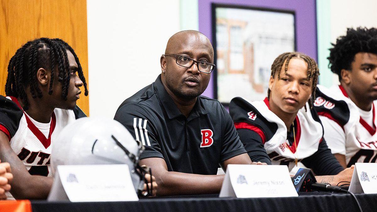 Butler coach Glenwood Ferebee speaks with players during media day at Rocky River High School in Mint Hill, N.C., on Monday, July 29, 2024.