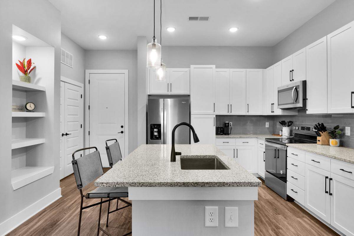 Mill One, a mixed-use development with 33,000-square-foot of commercial space and 90 high-end apartments, was completed last September. The first residents began moving last October.