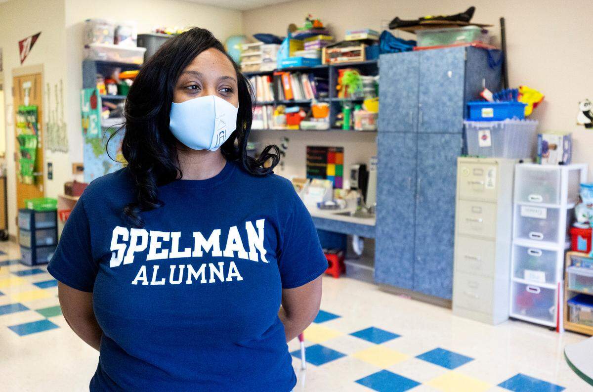 Erin Coles, the principal at Highland Renaissance Academy, poses for a portrait in a classroom in Charlotte, NC on Friday, October 30, 2020. Coles is confident that the measures put in place will help protect the teachers and the students during this transition time. 