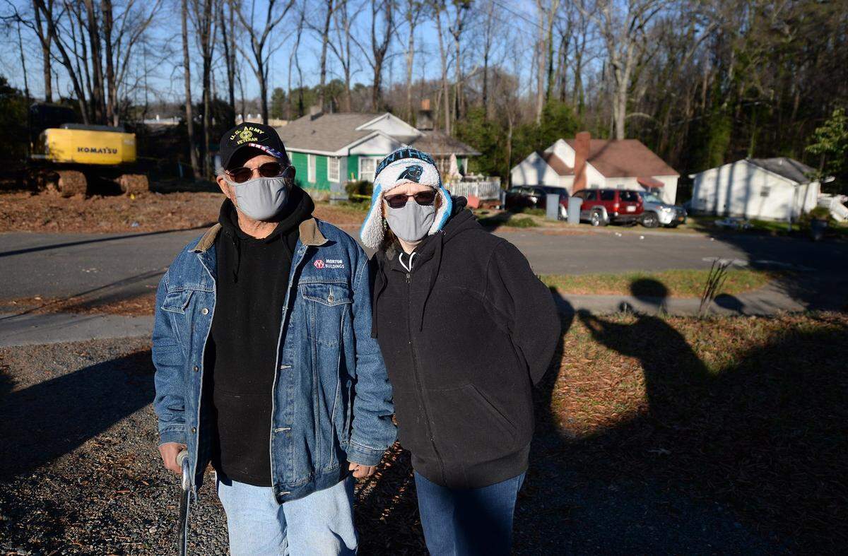 Howie Acres residents Willie and Kim Mason. Willie Mason’s great uncle helped found Howie Acres and provide opportunities for Black homeowners during segregation. Now, Mason worries he could be priced out of Charlotte.