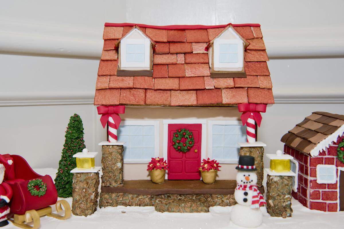 The gingerbread house class at The Ballantyne Hotel includes the gingerbread, icing and candy.