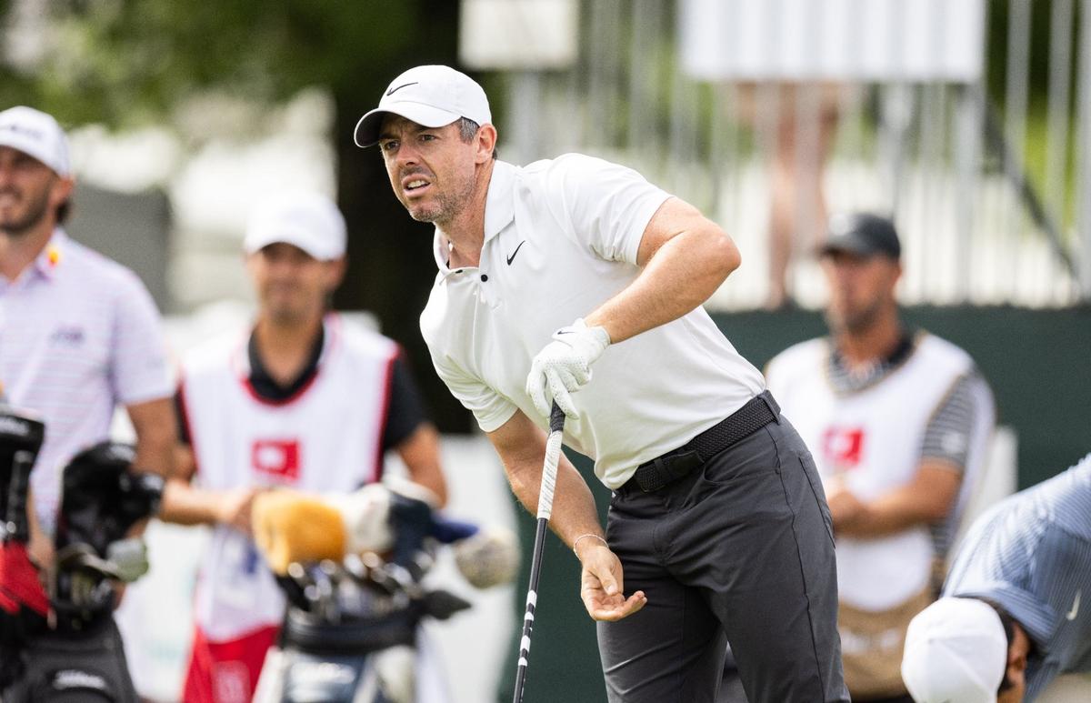 Rory McIlroy watches his ball after hitting from the 10th tee during round one of the Wells Fargo Championship at Quail Hollow Club in Charlotte, N.C., on Thursday, May 9, 2024.