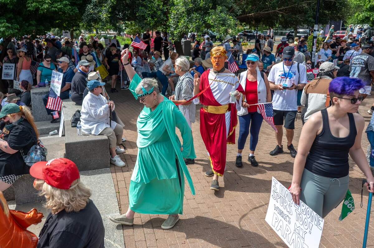 Marchers gather in uptown Charlotte before the ‘No Kings, anti-Trump’ rally Saturday, June 14, 2025