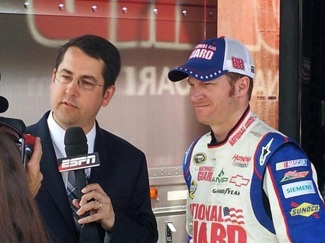 Ryan McGee, shown with Dale Earnhardt Jr. at a race a few years ago, says: “The only reason he’s doing the book — I mean, he’s got money. He doesn’t need money. He’s not gonna get rich off this book anyway. But he’s doing this because he’s trying to help people.”