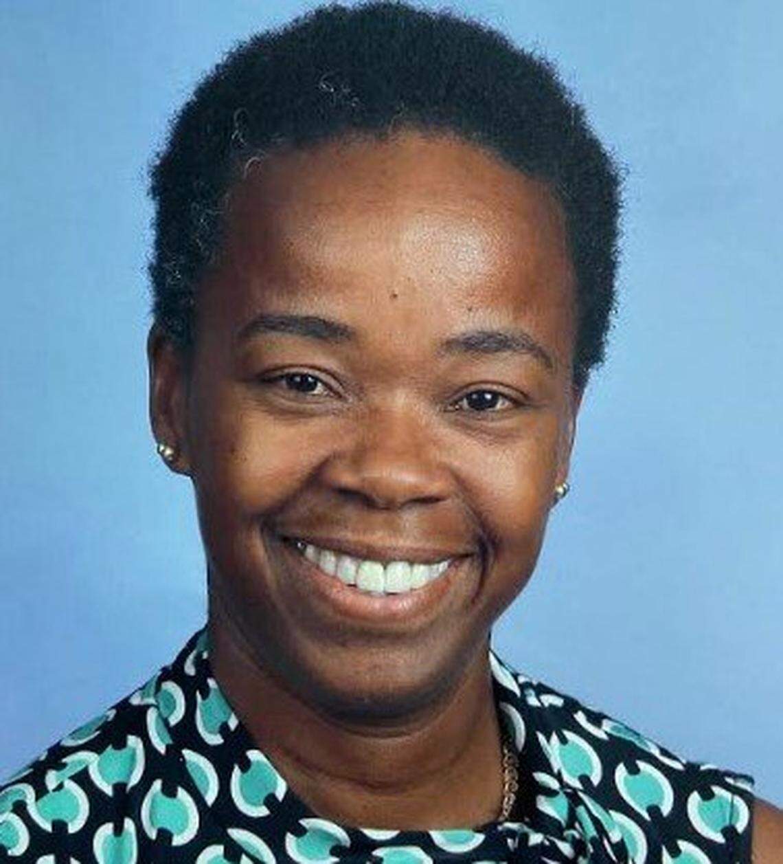 Providence Day girls track coach Carol Lawrence now heads the cross-country and track and field programs at Johnson C. Smith University.