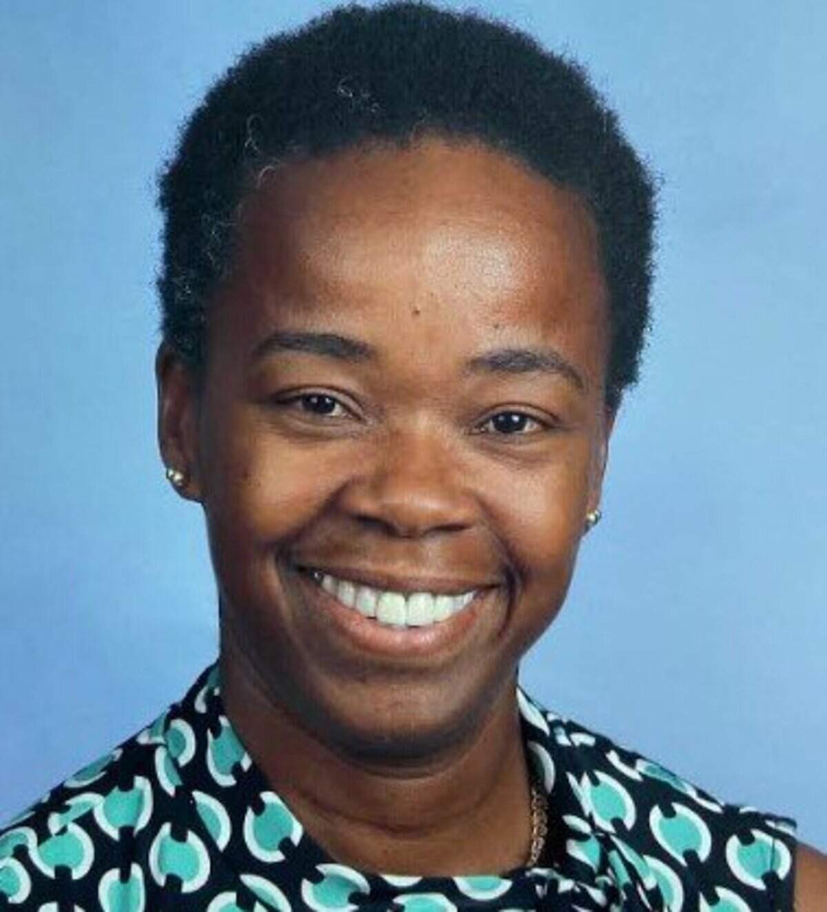 Providence Day girls track coach Carol Lawrence now heads the cross-country and track and field programs at Johnson C. Smith University.