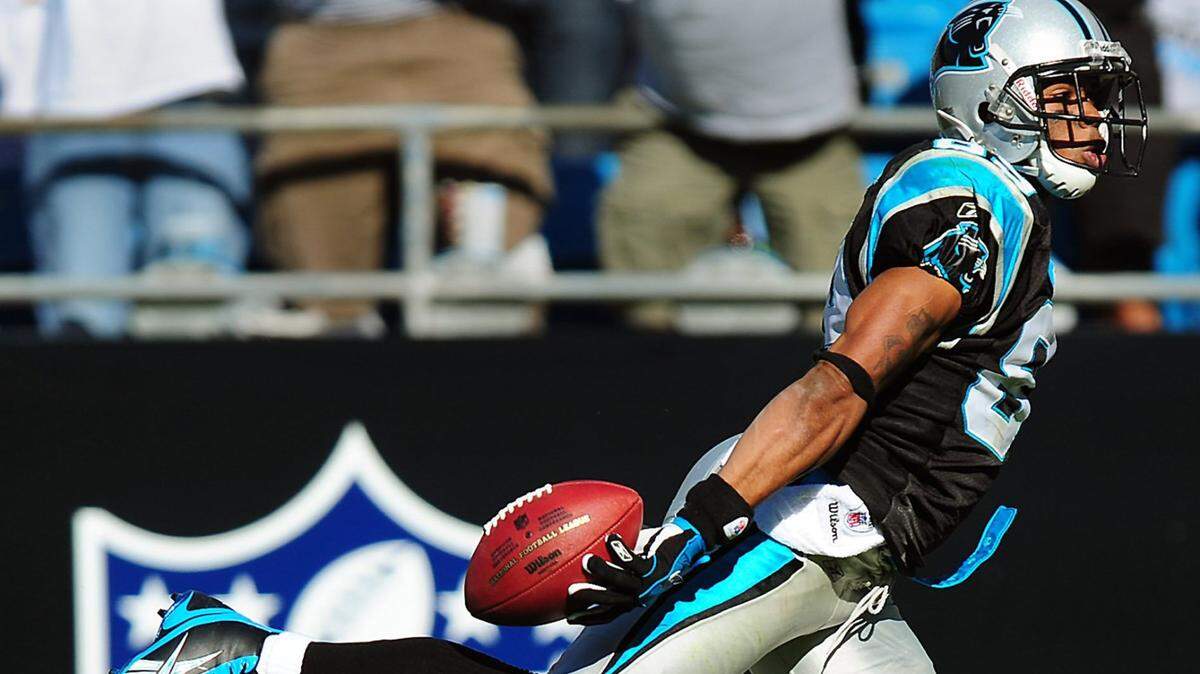 Carolina Panthers wide receiver Steve Smith leaps into the end zone for a touchdown in 2008 against Arizona.