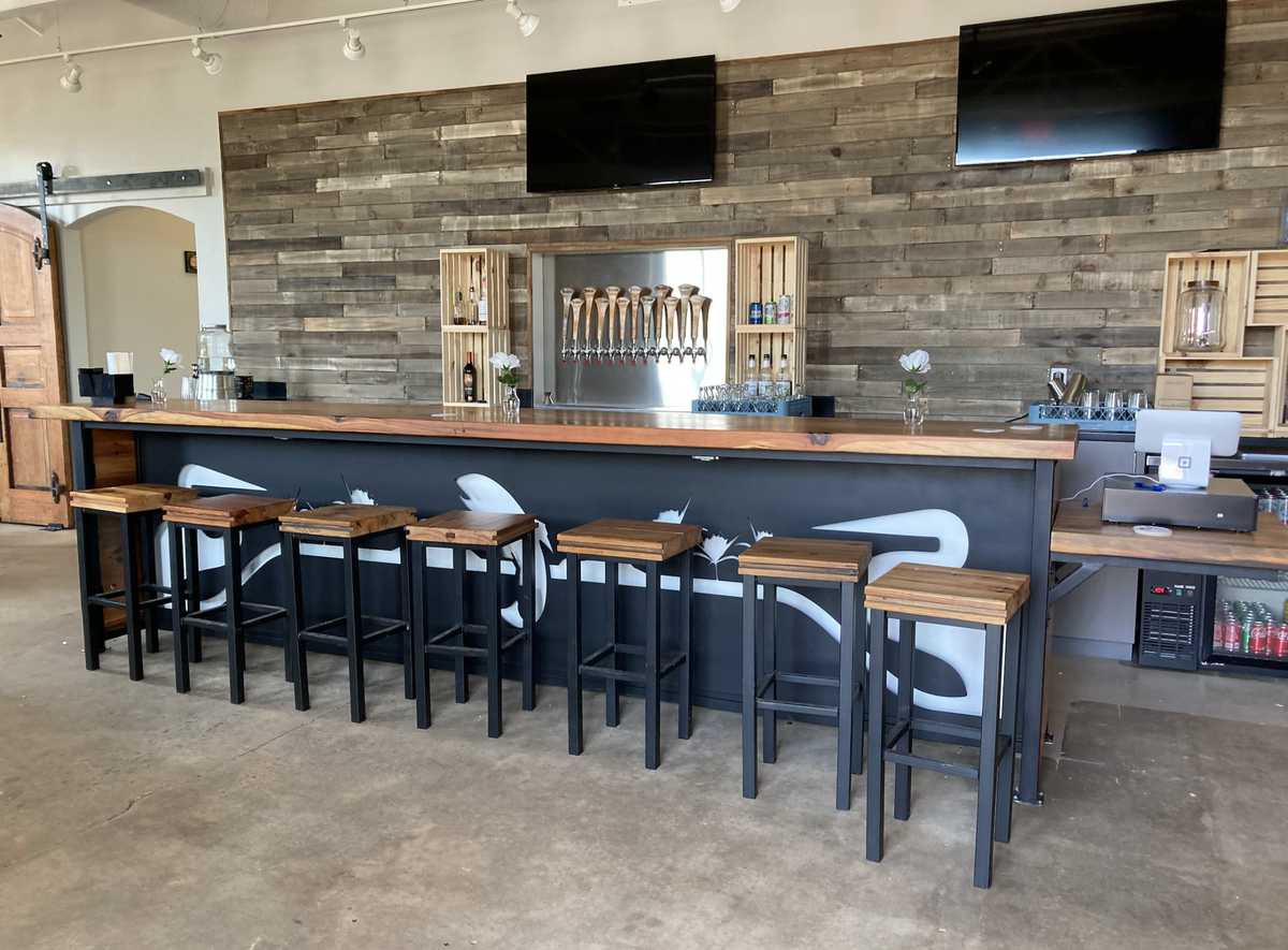 The River Room is now open in Dynamo 31, a renovated yarn mill from the 1940s. The two-story taproom is run by the Catawba Riverkeeper and serves draft beer from brew kettles around the river basin.