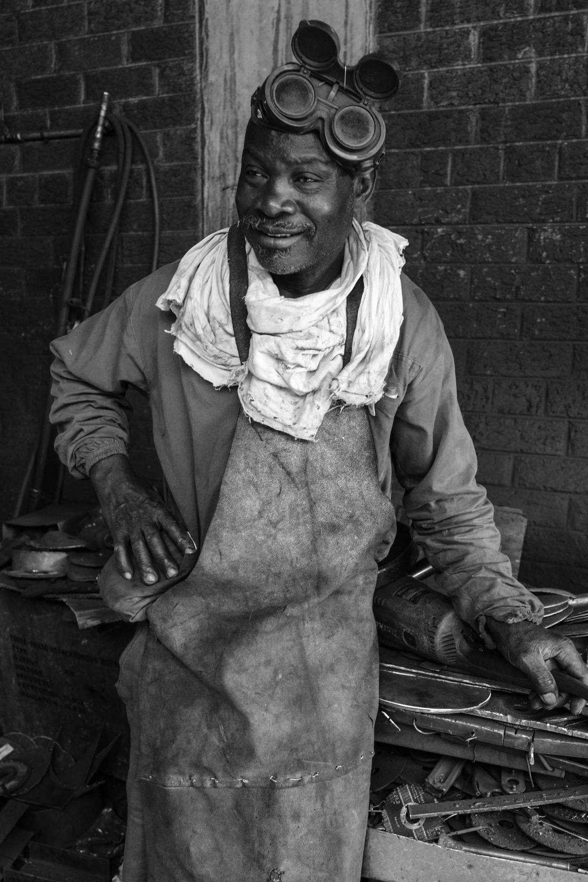 “Machinist,” a photograph by Michael Maxwell, is one of more than 40 images included in the LOCAL/STREET exhibit at Mint Museum Randolph.