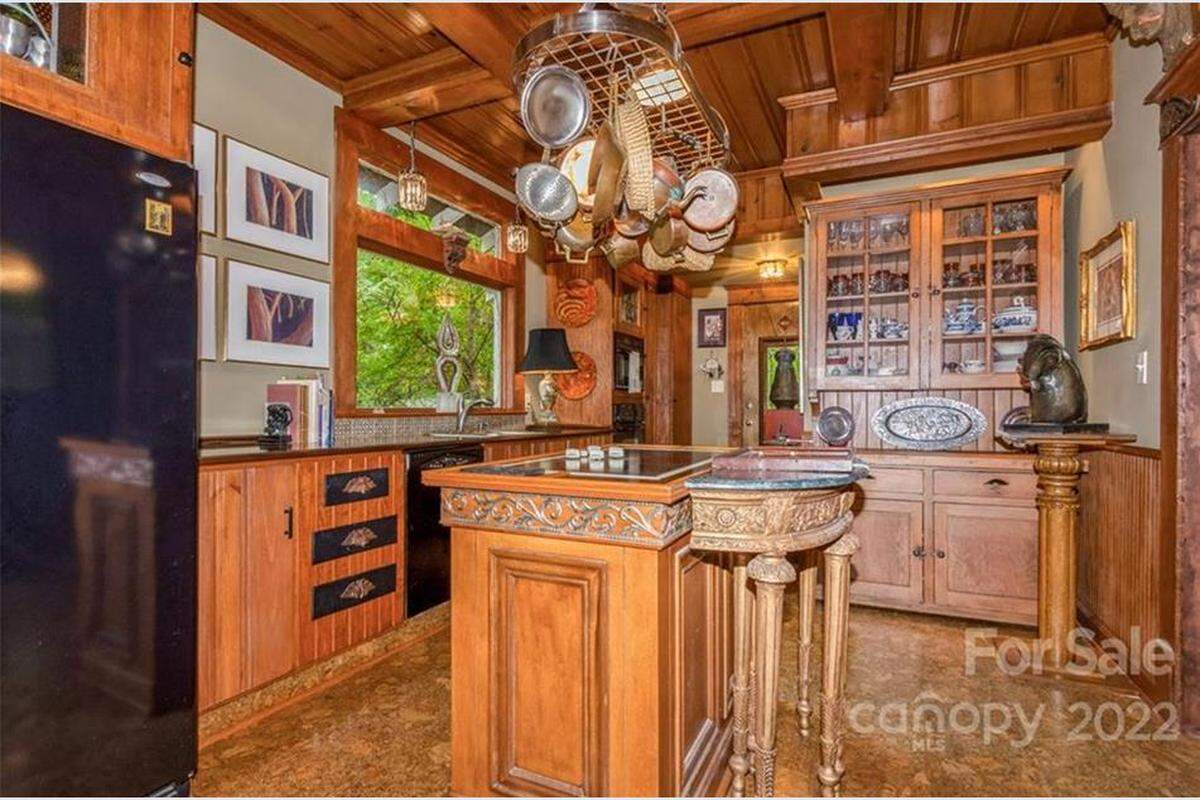 The kitchen in Grand Oaks has cork flooring and solid cherry counter tops.
