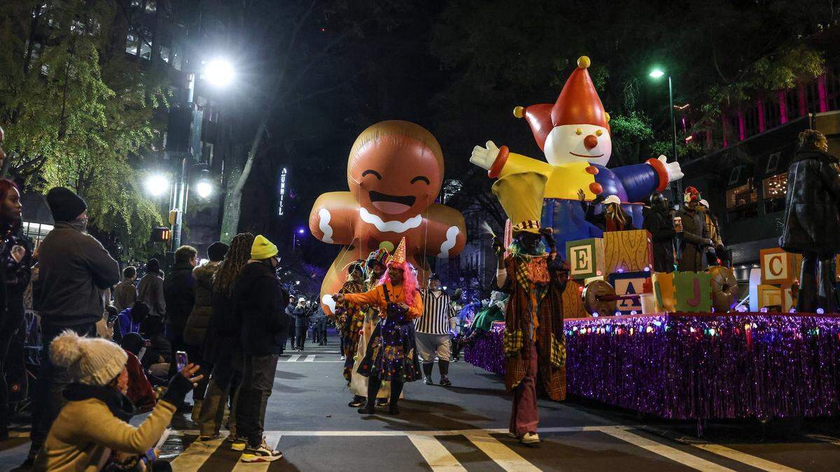 Balloons make their way through an intersection at the Novant Health Thanksgiving Day Parade in Charlotte, N.C., on Wednesday, November 24, 2021.