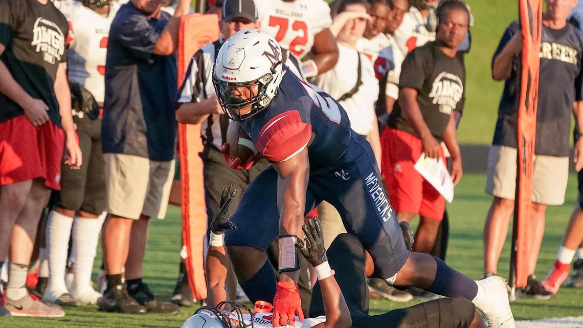 Mallard Creek’s Trenton Simpson gets the 1st down.