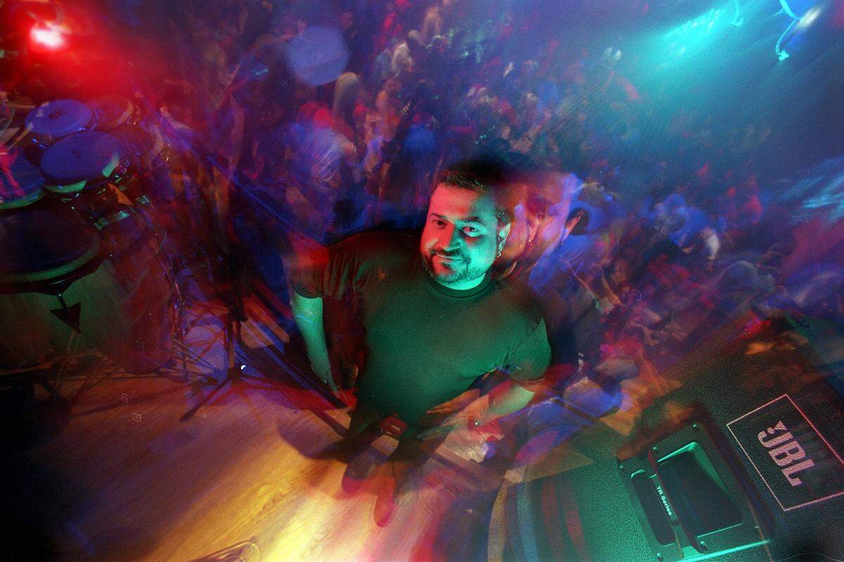 Andy Kastanas, kingpin of Charlotte’s uptown bar scene in the 1990s, is shown at Mythos in August 1999. Kastanas, a sometime DJ, built a network of clubs and bars that packed in the crowds for years. He owned Mythos, Cosmos and Salamandra along with a few partners.
