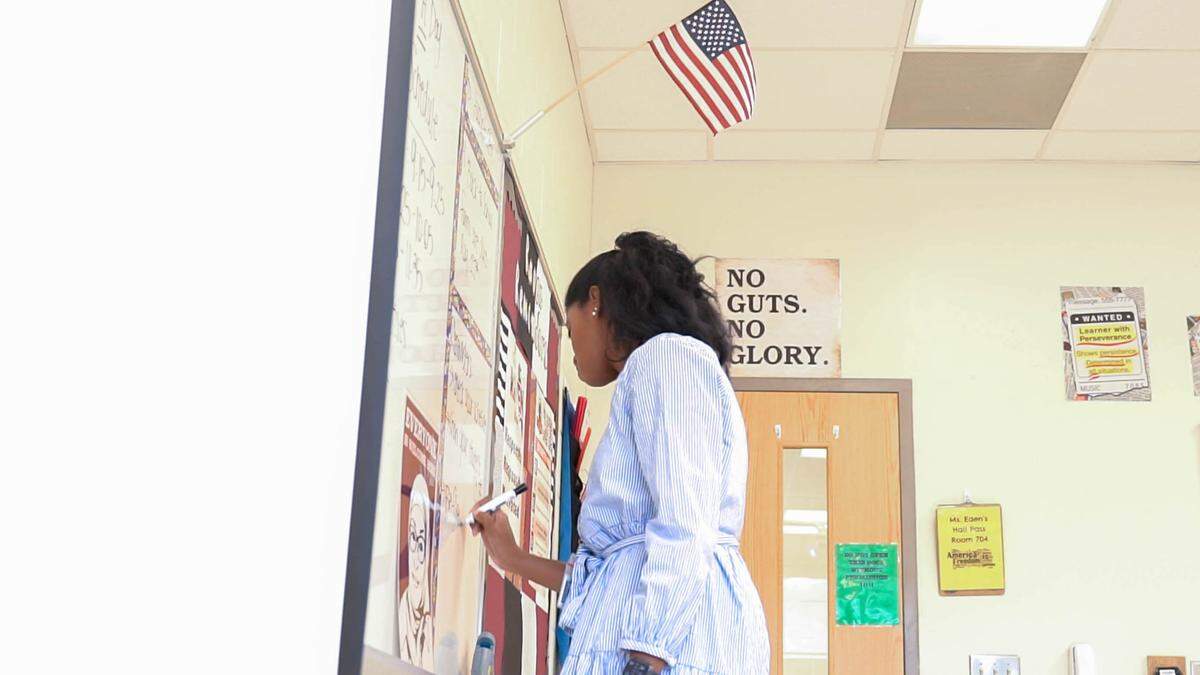 Kiara Eden teaches students about 9/11. It’s personal for her: Her father was deployed to Afghanistan twice after the event.