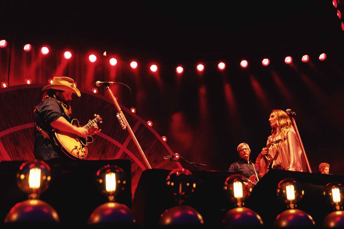 Chris and Morgane Stapleton perform as part of the “All-American Road Show Tour” at Bank of America Stadium in Charlotte on Saturday night.
