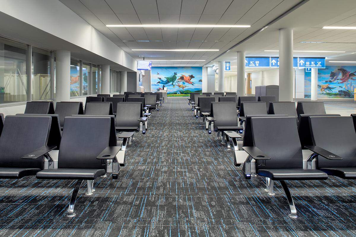 As part of the renovation, the airport installed 950 new chairs, each with a charging port.