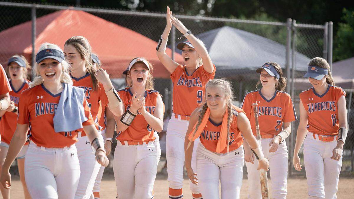 Marvin Ridge celebrates Anna Mcgowan (12) two run homerun. South Meck would host Marvin Ridge in the 4th round Women’s Softball high school playoffs Friday May 20, 2022.