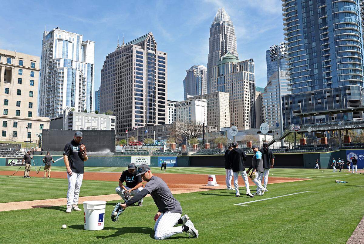 Members of the Charlotte Knights run through drills at Truist Field in on Wednesday. The Knights open the season Friday at home against the Durham Bulls.