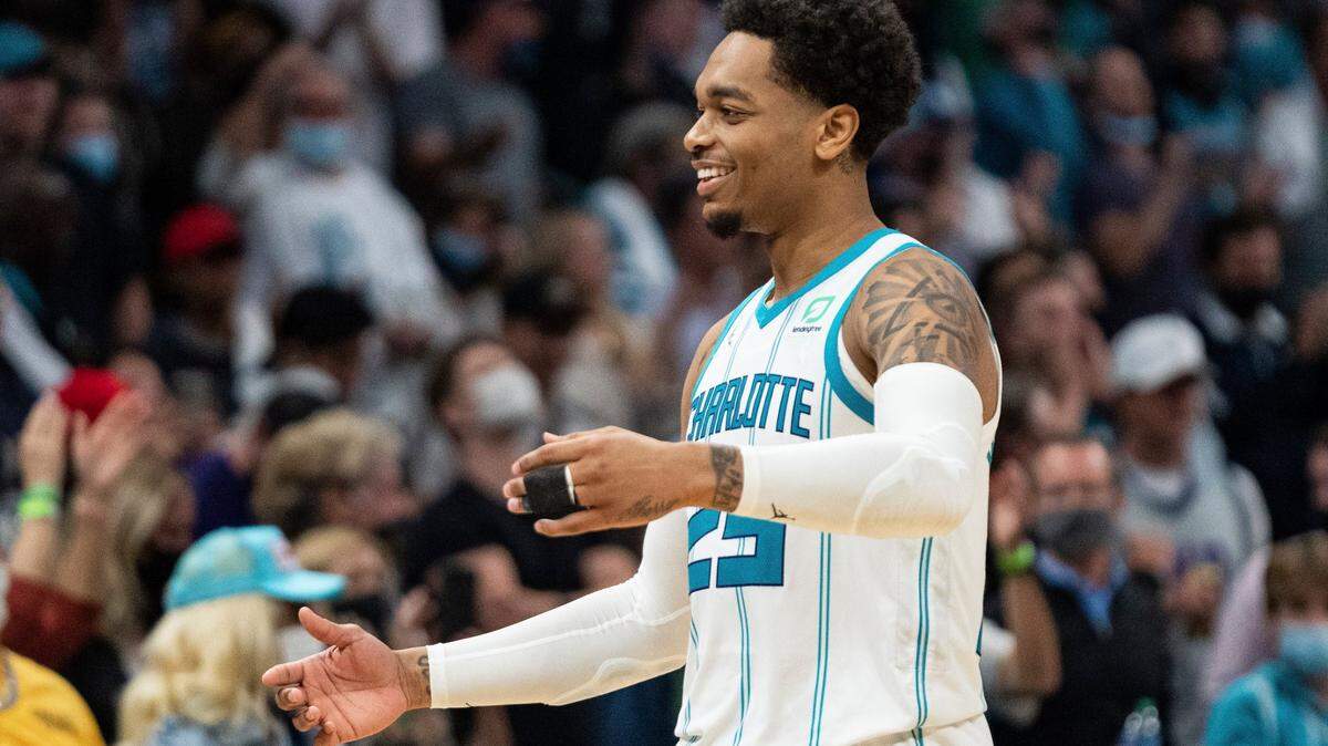 Charlotte Hornets forward P.J. Washington reacts after making a free throw to give the Hornets the lead against the Indiana Pacers during the second half of an NBA basketball game in Charlotte, N.C., Wednesday, Oct. 20, 2021. (AP Photo/Jacob Kupferman)