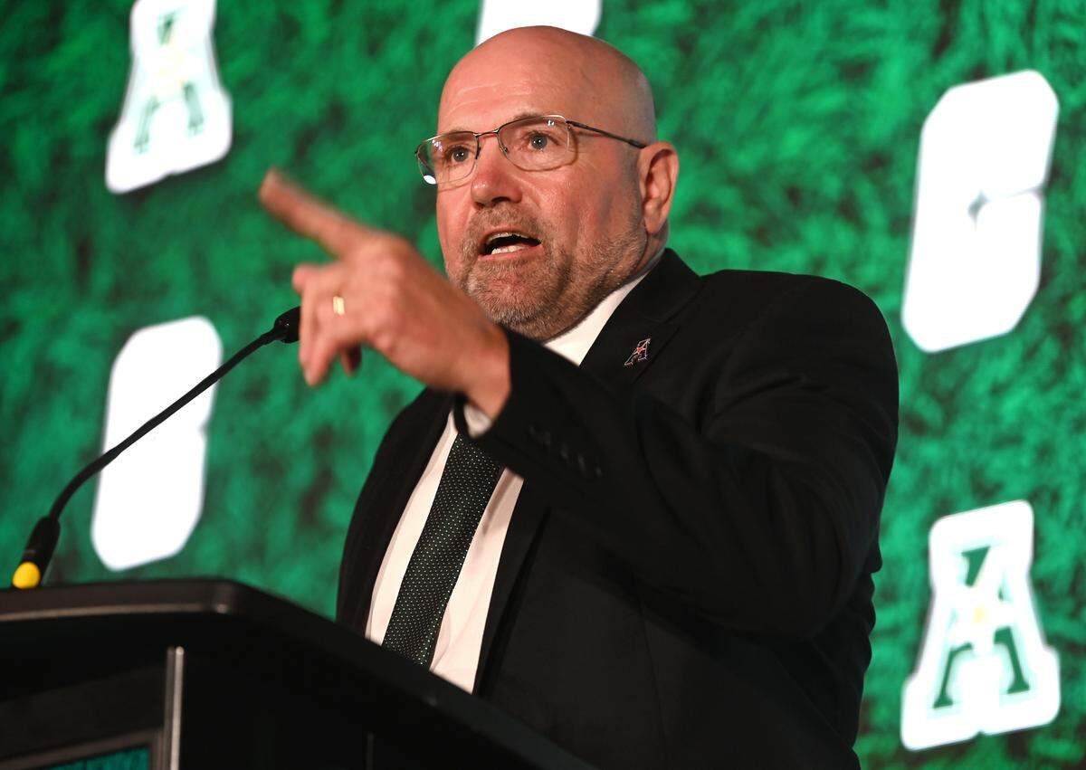 Charlotte 49ers head football coach Tim Albin speaks during media day for the American Conference on Friday, July 25, 2025 at the Charlotte Convention Center in Charlotte, NC.