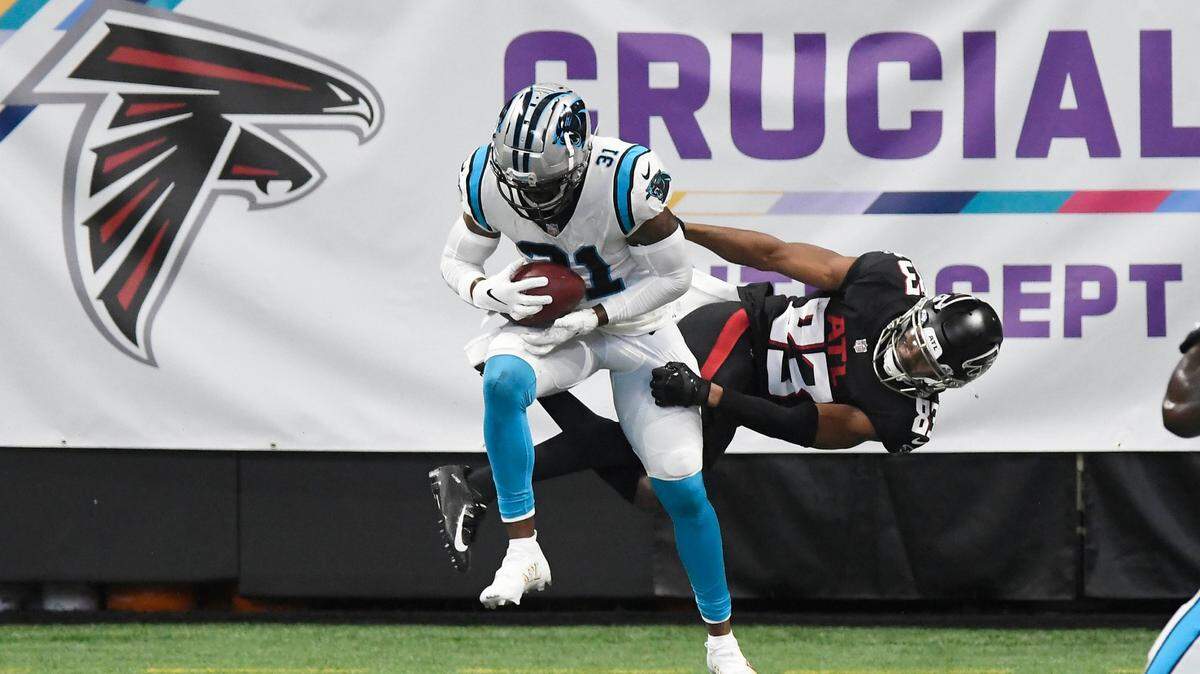 Carolina Panthers strong safety Juston Burris (31) intercepts a pass in the end zone intended for Atlanta Falcons wide receiver Russell Gage (83) during the fourth quarter at Mercedes-Benz Stadium in Atlanta, GA on Sunday, October 11, 2020. The Panthers won 23-16.