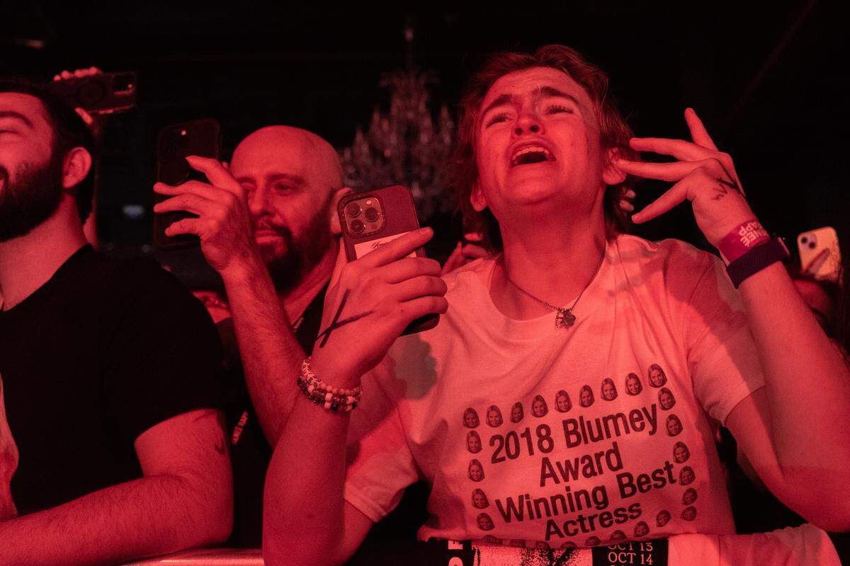 A concertgoer wears a 2018 Blumey Award T-shirt in honor of the award Reneé Rapp once won as a high school student in Charlotte.