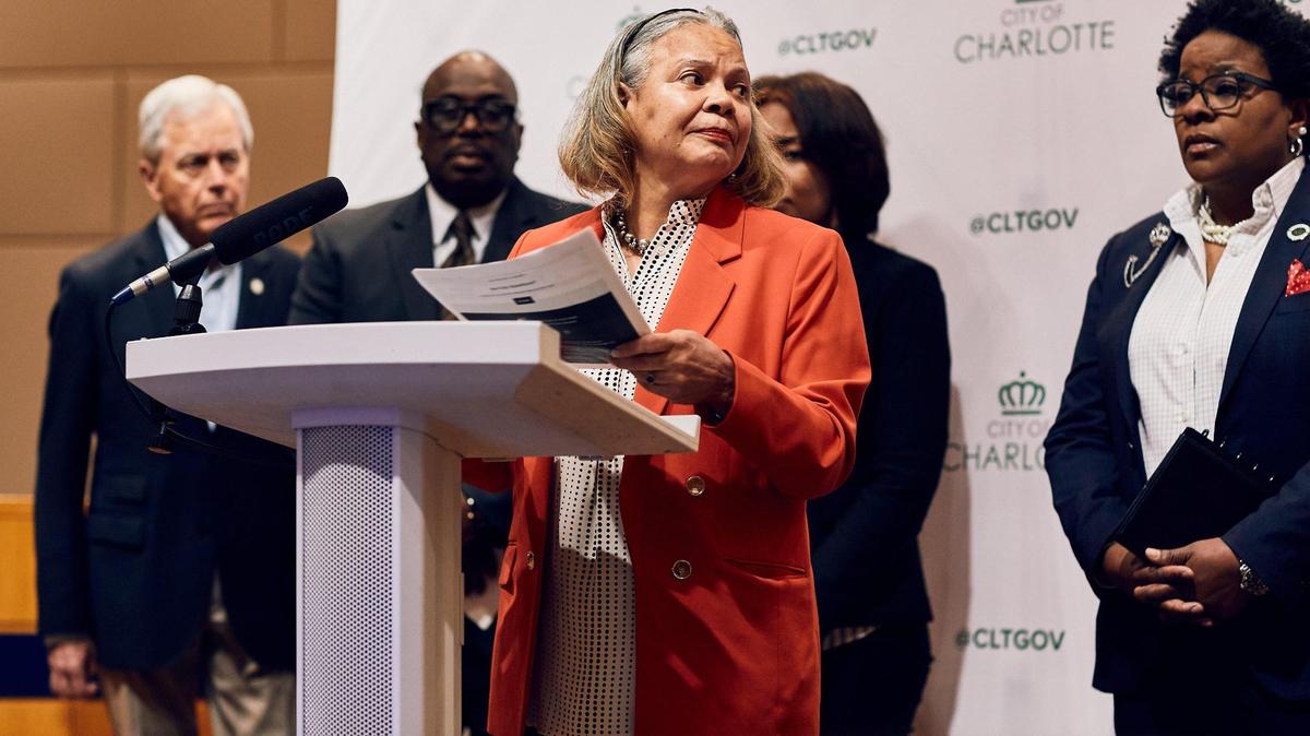 Charlotte Mayor Vi Alexander Lyles leaves the pulpit after addressing the recently reported settlement where the current city council and mayor praised the police chief and offered little information on the closed doors settlement in Charlotte, NC. The Charlotte City Council members watch on in support of the Mayor and Police Chief after defending remarks made by their colleague City Councilwoman at-large Victoria Watlington in the press.