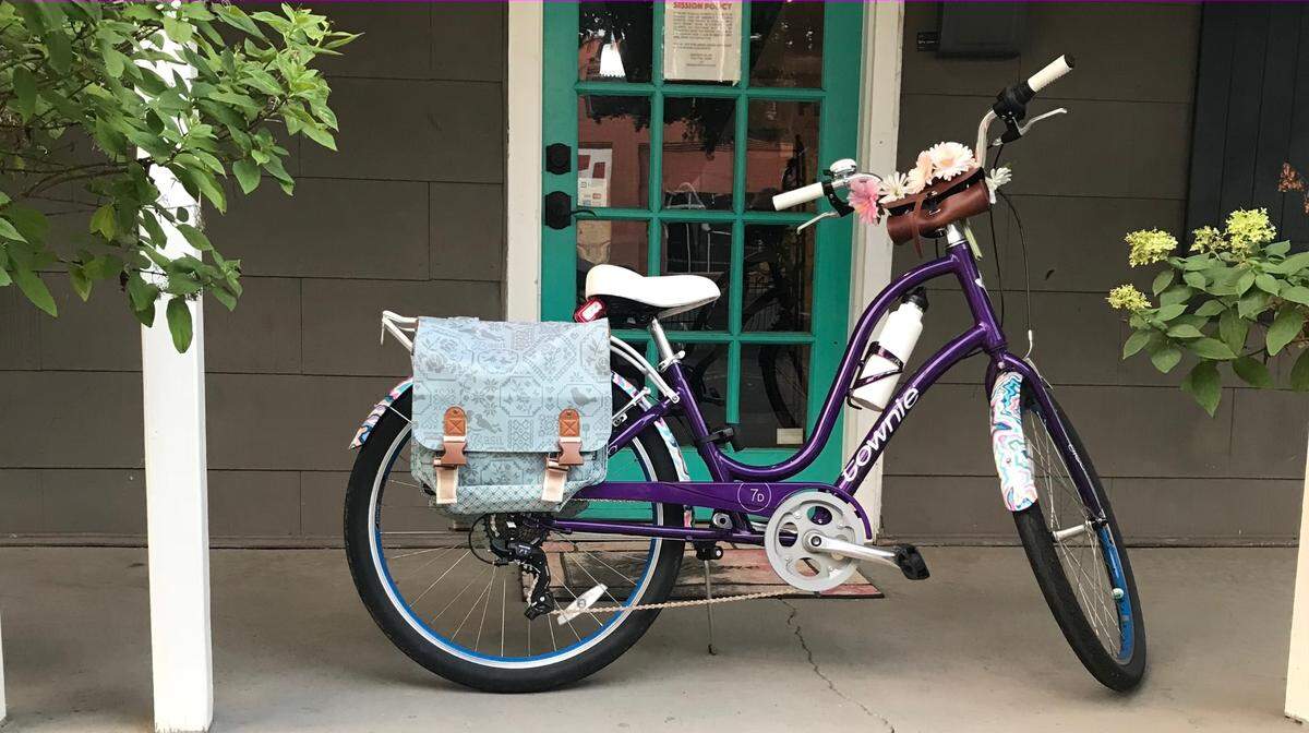 Saddlebags can help with carrying items from the store. CharlotteFive’s Melissa Oyler can fit a week’s worth of groceries in hers, including almond milk and eggs (yes, even eggs survive the trip home).
