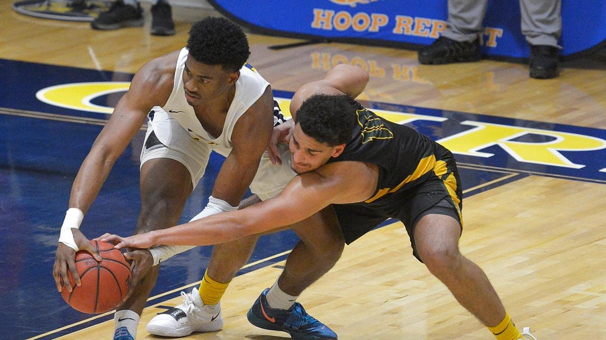 Carmel Christian #10 Donovan Gregory and Independence #10 Miles Pauldin fight for a loose ball during Saturday’s Independence at nationally ranked Carmel Christian basketball game at Carmel Christian .Independence is the reigning N.C. 4A public school state champion. Carmel Christian is the reigning N.C. 2A independent School state champ.