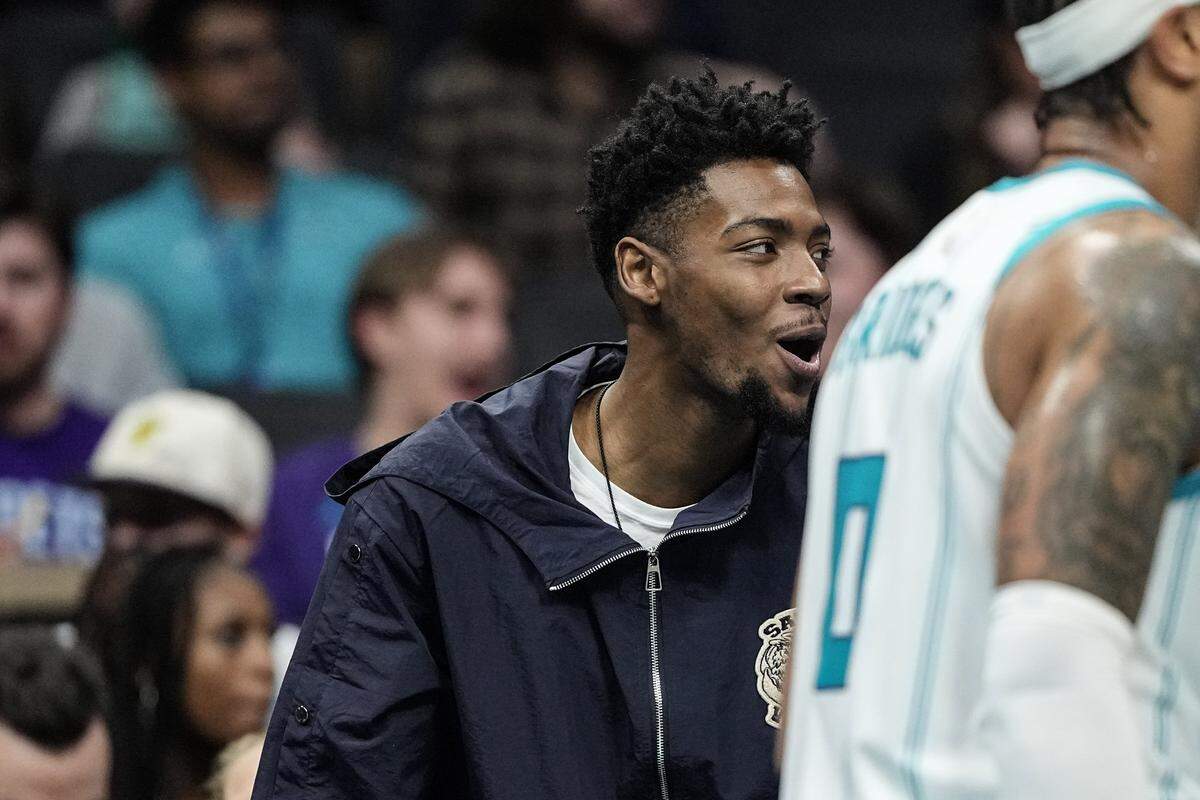 Charlotte Hornets forward Brandon Miller reacts during the first half of an NBA basketball game against the Toronto Raptors, Wednesday, Jan. 7, 2026, in Charlotte, N.C.