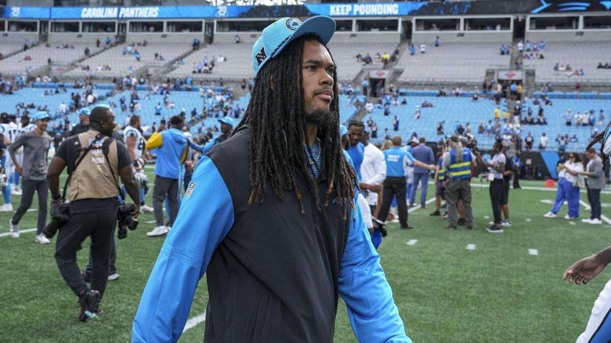 Sep 15, 2024; Charlotte, North Carolina, USA; Carolina Panthers running back Jonathon Brooks (24) walks off the field after the second half against the Los Angeles Chargers at Bank of America Stadium. Mandatory Credit: Jim Dedmon-Imagn Images