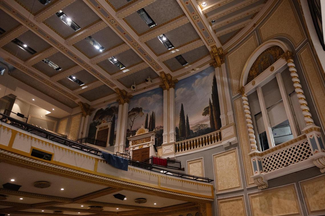 The artwork on the walls is modeled after the theater's original hand-painted plaster.