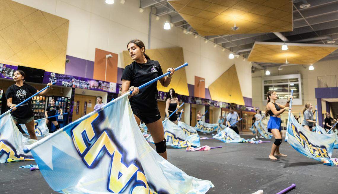 The Ardrey Kell color guard practices at Ardrey Kell High School in Charlotte, N.C., on Wednesday, August 6, 2025.