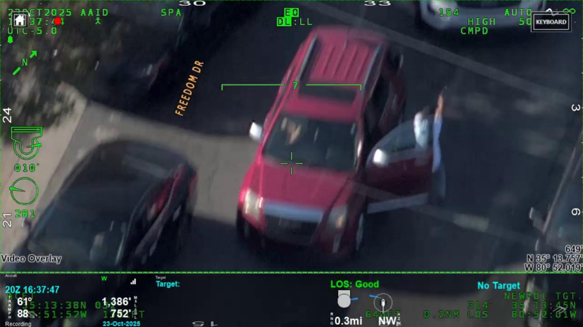 From a letter that Mecklenburg County District Attorney Spencer Merriweather sent to the State Bureau of Investigation, this is reportedly a photograph of Joseph Andrade exiting a vehicle and firing at police.