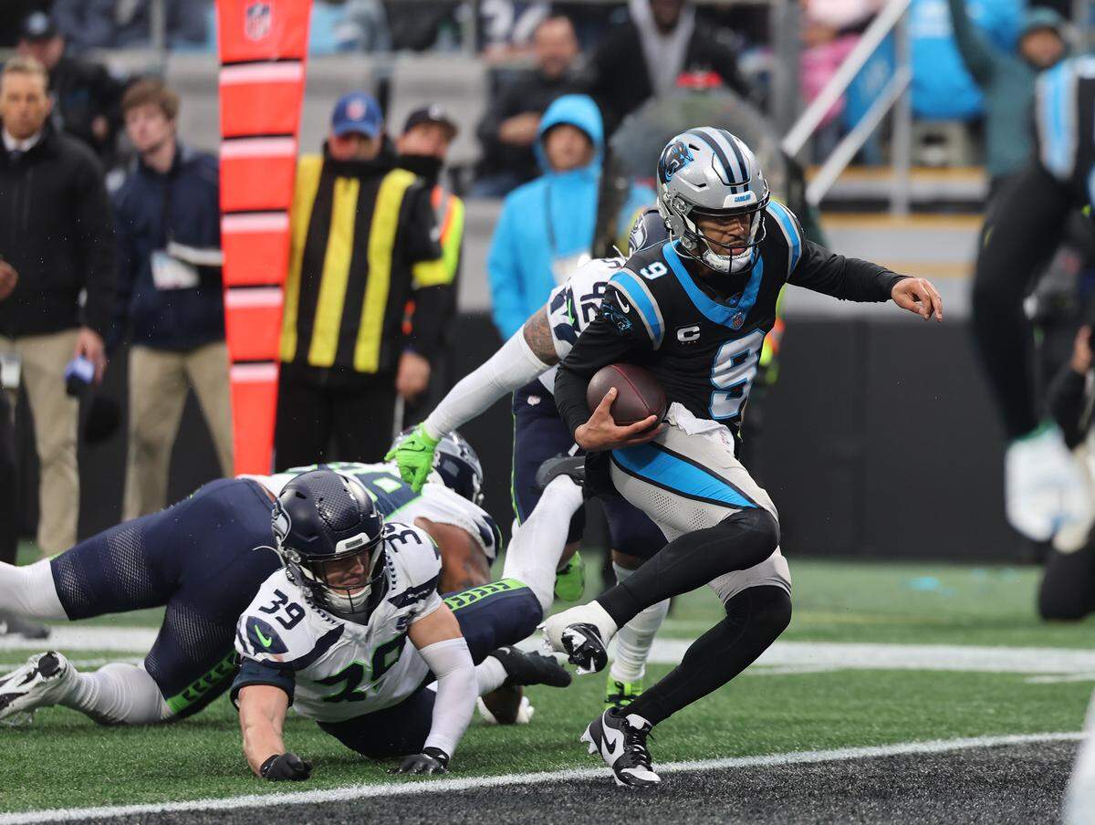 Carolina Panthers quarterback Bryce Young scores a touchdown Sunday, Dec. 28, 2025 during the game against the Seattle Seahawks at Bank of America Stadium in Charlotte