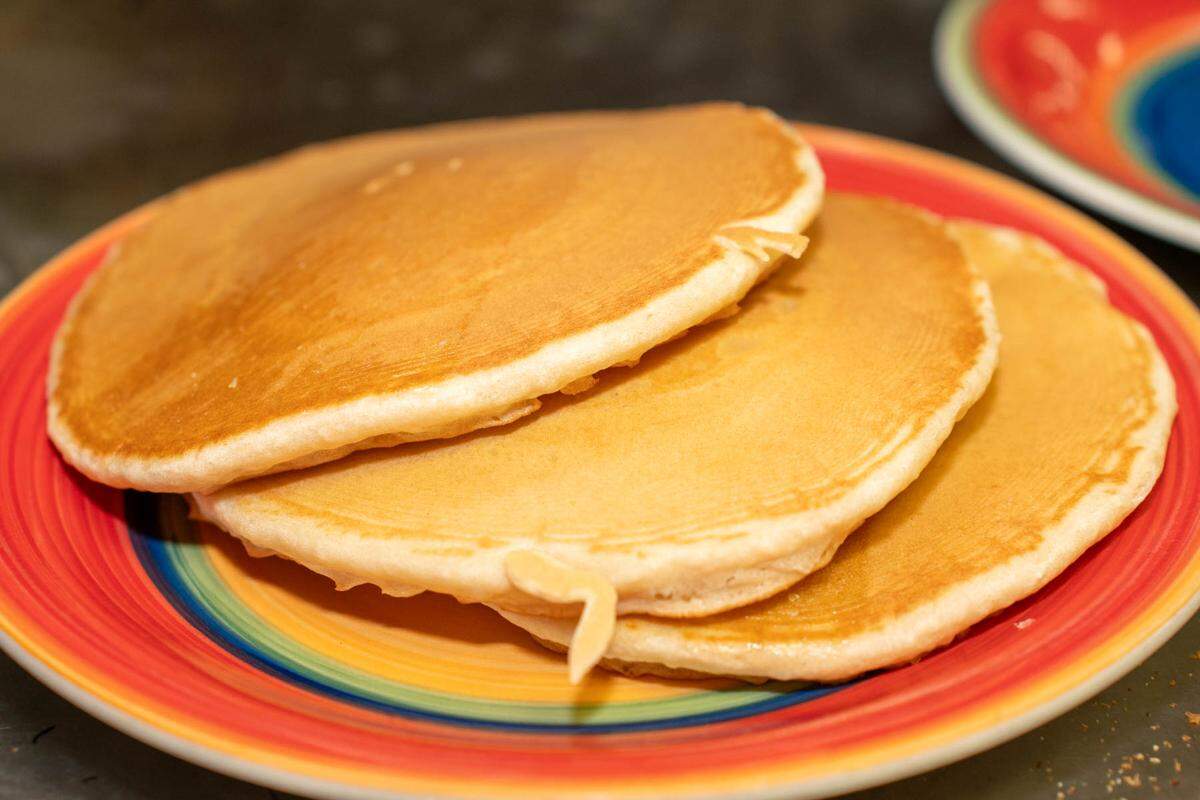 Three buttermilk hot cakes at Dino’s Family Restaurant cost $7.95.