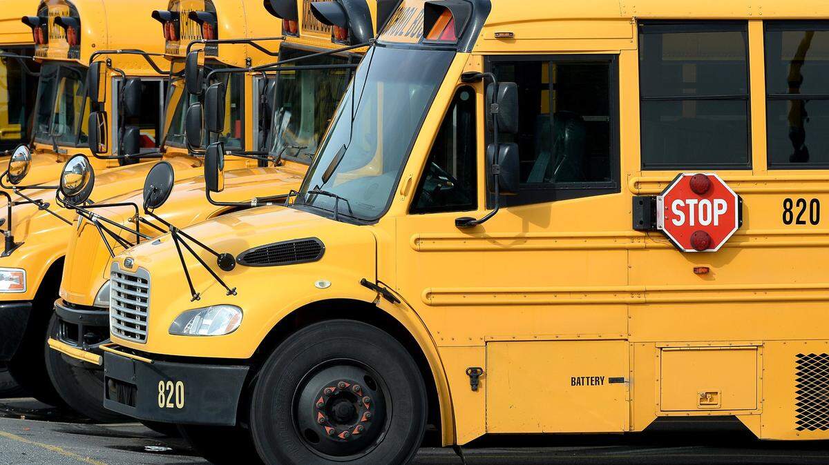 School buses at Charlotte-Mecklenburg Schools lot on Wilkinson Boulevard in Charlotte, NC.