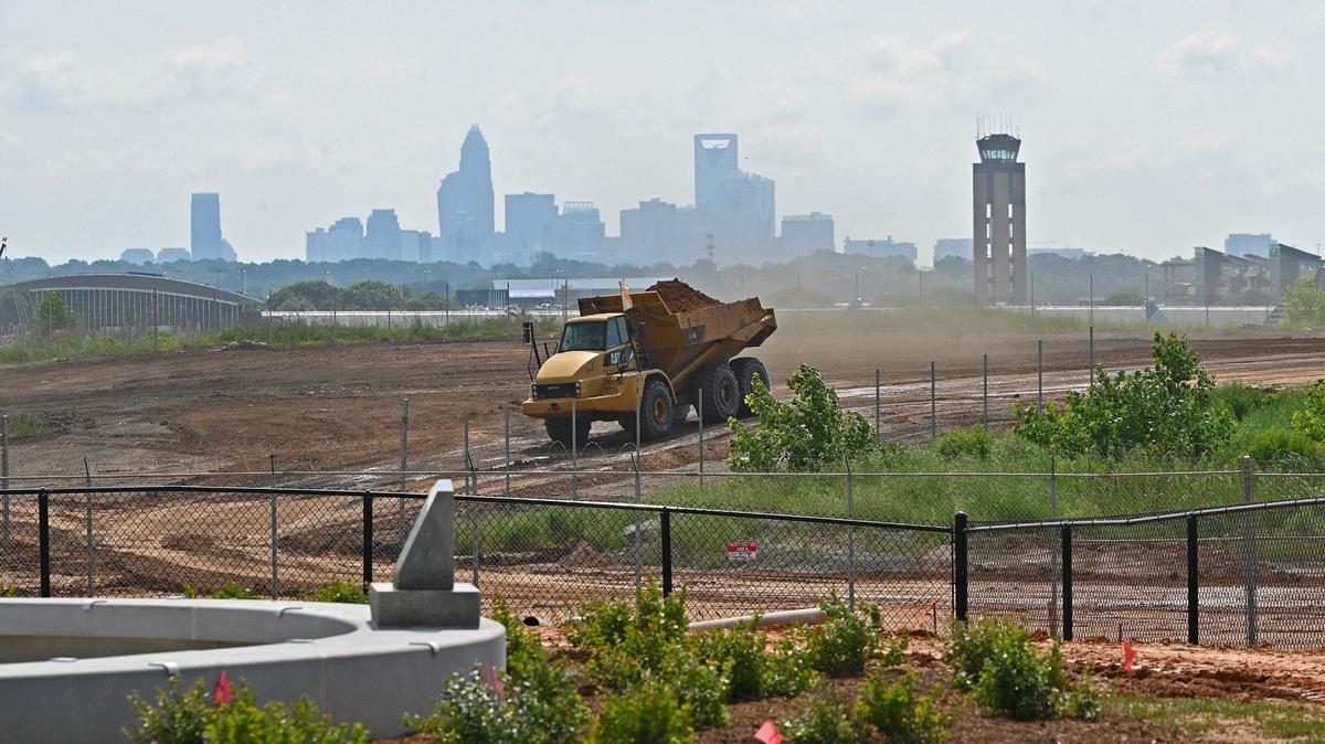 Construction continues near the new Airport Overlook during the summer at Charlotte Douglas International Airport. Work for an aircraft taxiway project is closing roads near the airport.