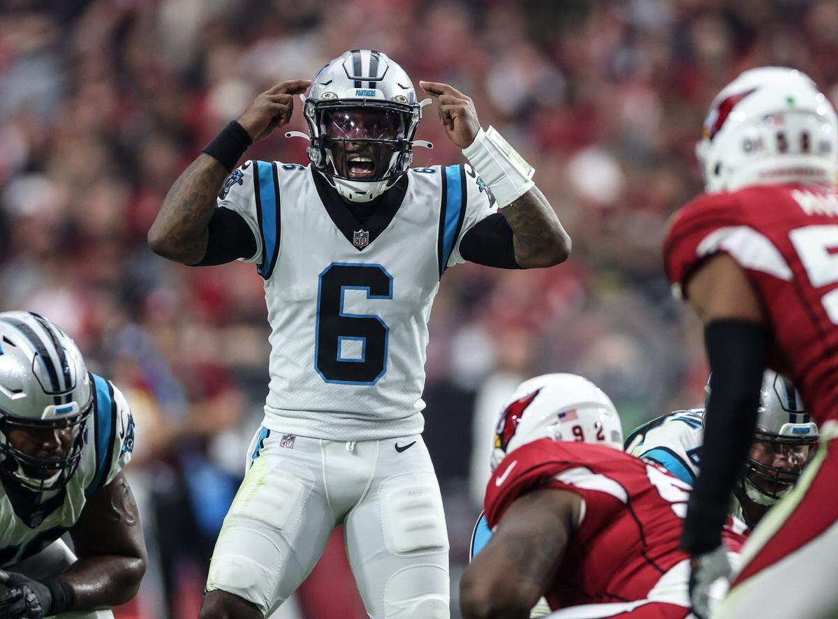 Carolina Panthers P.J. Walker, gestures to teammates before a play against the Arizona Cardinals at the State Farm Stadium in Glendale AZ, on Sunday, November 14, 2021.